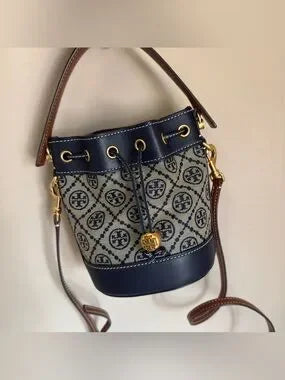 Tory Burch blue and brown mini bucket bag detail
