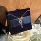 Swarovski rose gold key pendant necklace detail