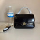 Tory Burch Robinson Spazzolato small top handle bag detail