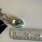 Swarovski green and silver crystal pendant necklace detail