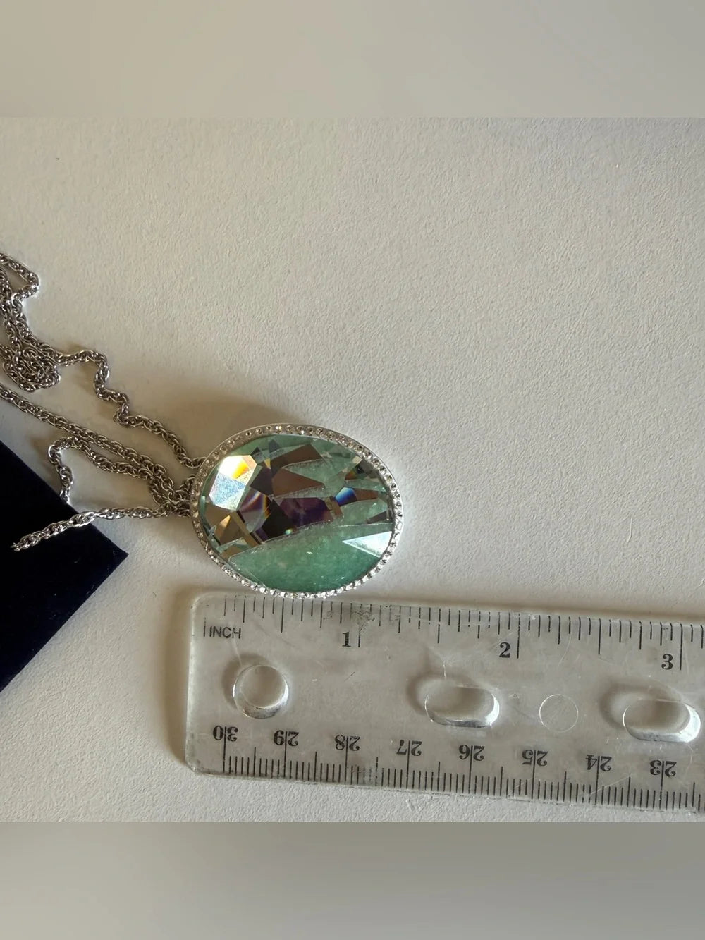 Swarovski green and silver crystal pendant necklace detail