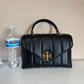 Tory Burch Kira 83943 black quilted satchel detail