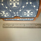 Tory Burch T Monogram denim shoulder bag in blue and brown detail