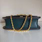 Tory Burch Fleming dark green leather shoulder bag detail