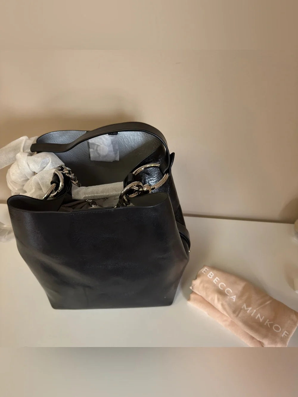 Rebecca Minkoff black leather structured backpack detail