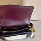 Tory Burch Robinson burgundy black and cream crossbody bag detail