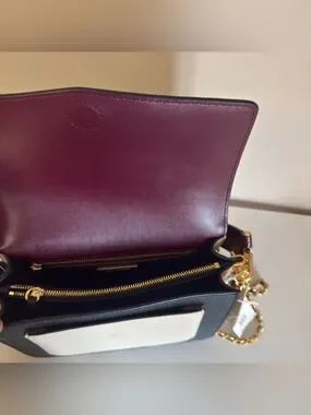 Tory Burch Robinson burgundy black and cream crossbody bag detail