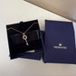 Swarovski rose gold key pendant necklace detail