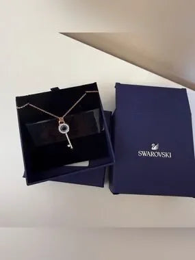 Swarovski rose gold key pendant necklace detail