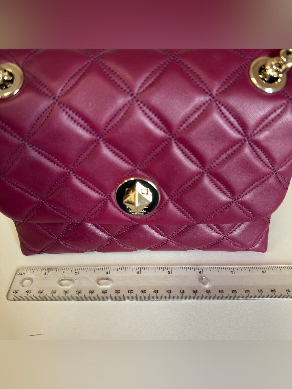 Kate Spade quilted shoulder bag in deep berry detail