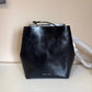 Rebecca Minkoff black leather structured backpack detail