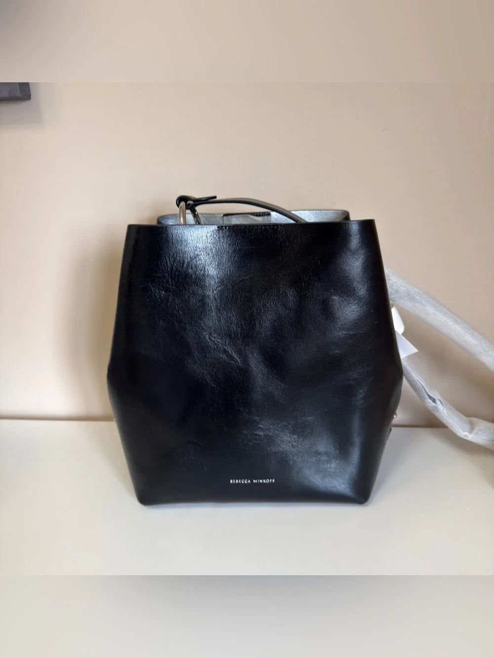 Rebecca Minkoff black leather structured backpack detail