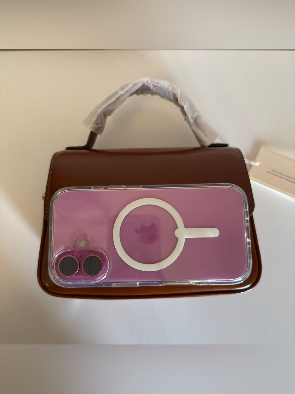 Tory Burch Robinson small brown top handle bag detail