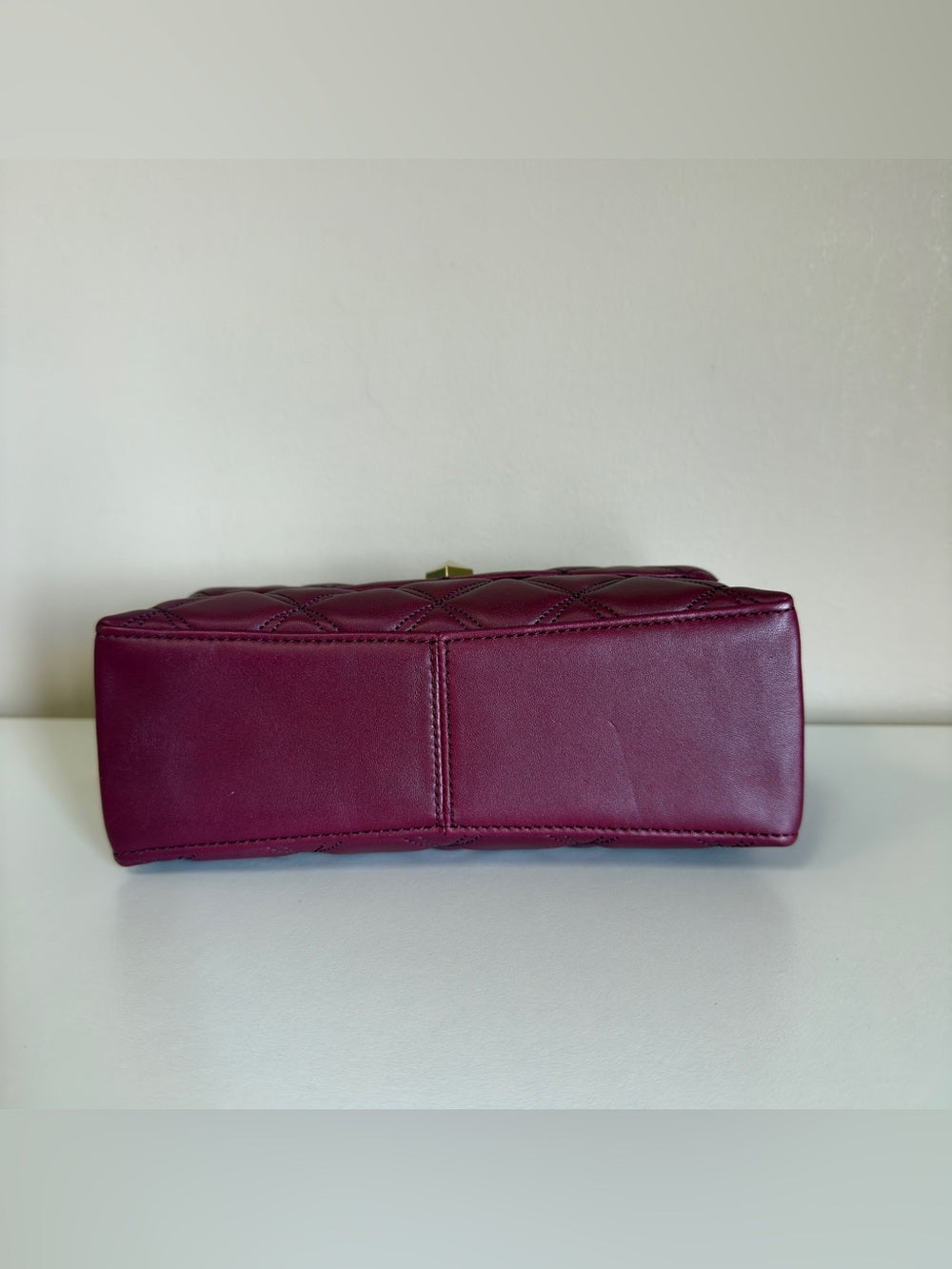 Kate Spade quilted shoulder bag in deep berry detail