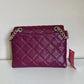 Kate Spade quilted shoulder bag in deep berry detail