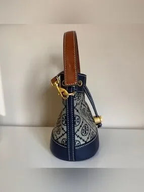 Tory Burch blue and brown mini bucket bag detail