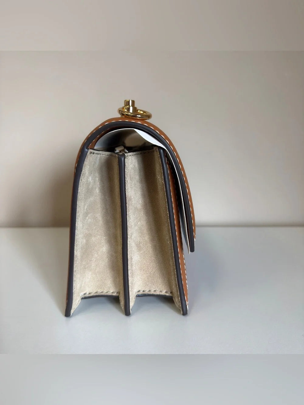 Tory Burch T Monogram denim shoulder bag in blue and brown detail