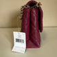 Kate Spade quilted shoulder bag in deep berry detail