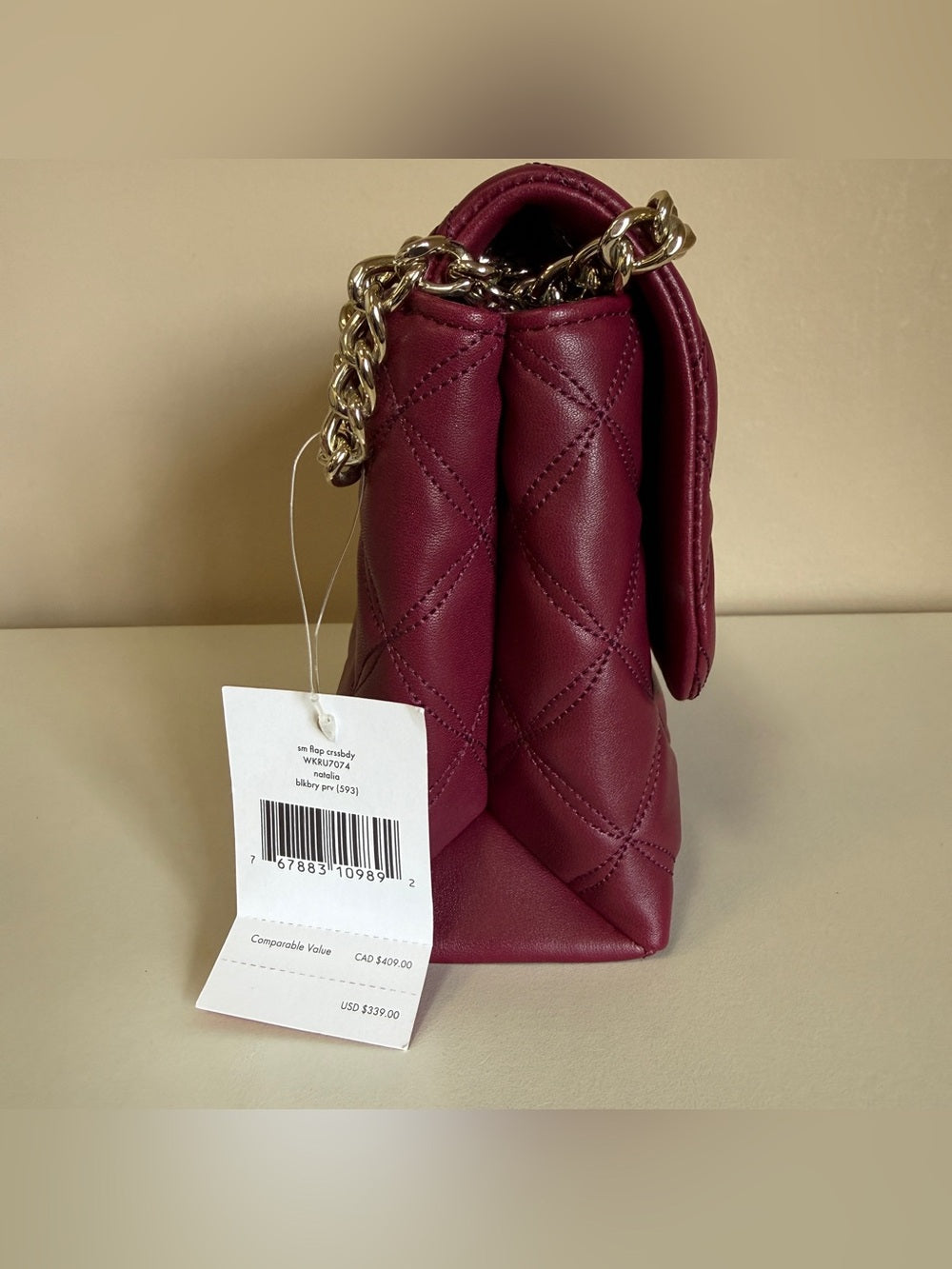 Kate Spade quilted shoulder bag in deep berry detail