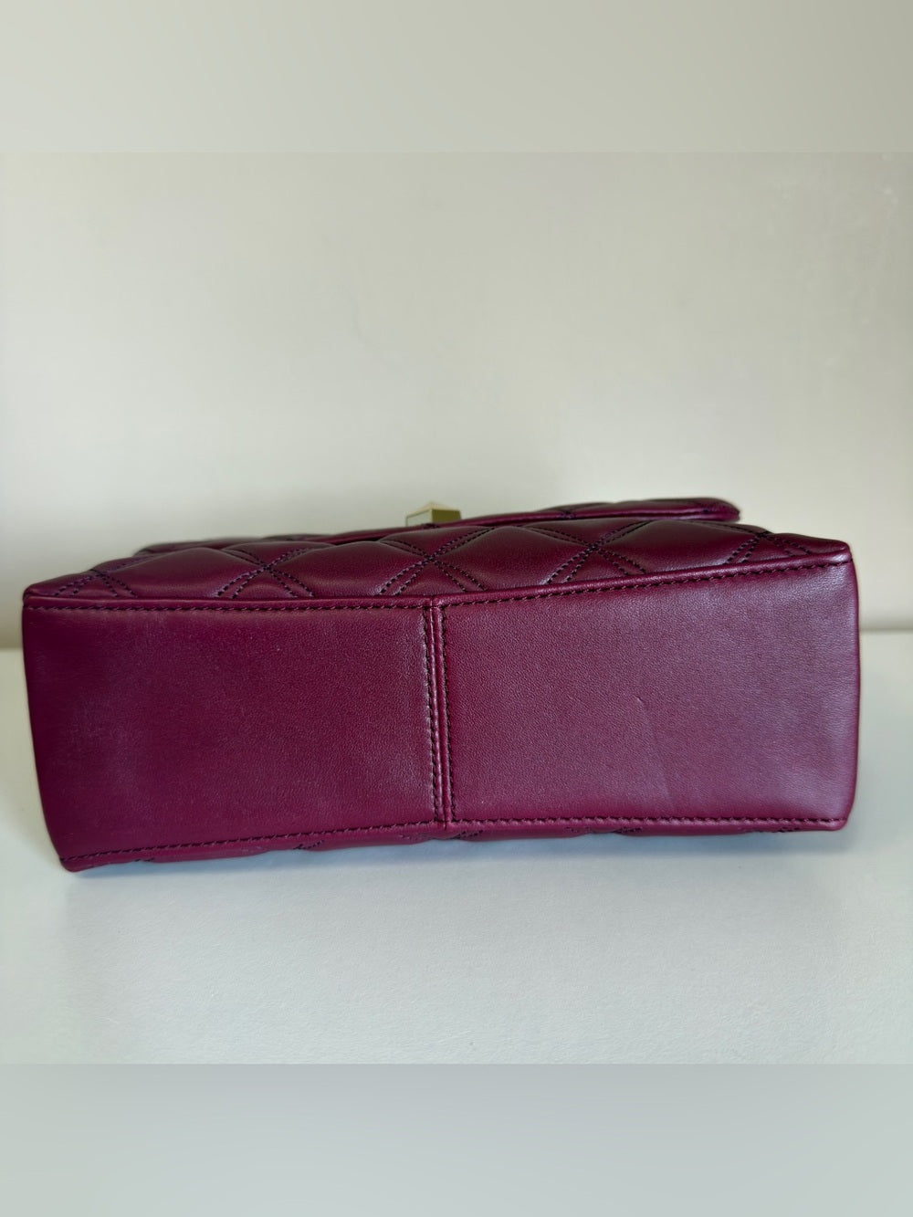 Kate Spade quilted shoulder bag in deep berry detail