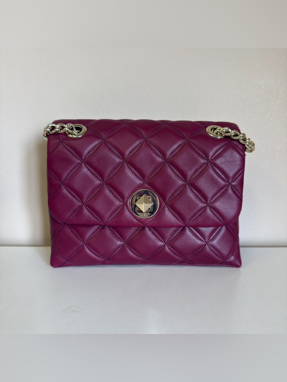 Kate Spade quilted shoulder bag in deep berry detail