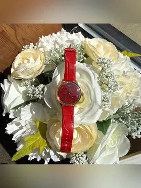 Swarovski red and gold watch detail