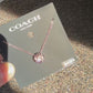 Coach 54514 rose gold disc pendant necklace product video