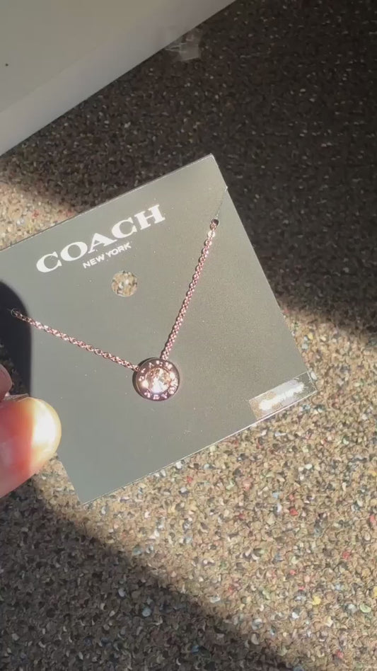 Coach 54514 rose gold disc pendant necklace product video