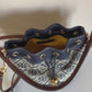 Tory Burch blue and brown mini bucket bag product video