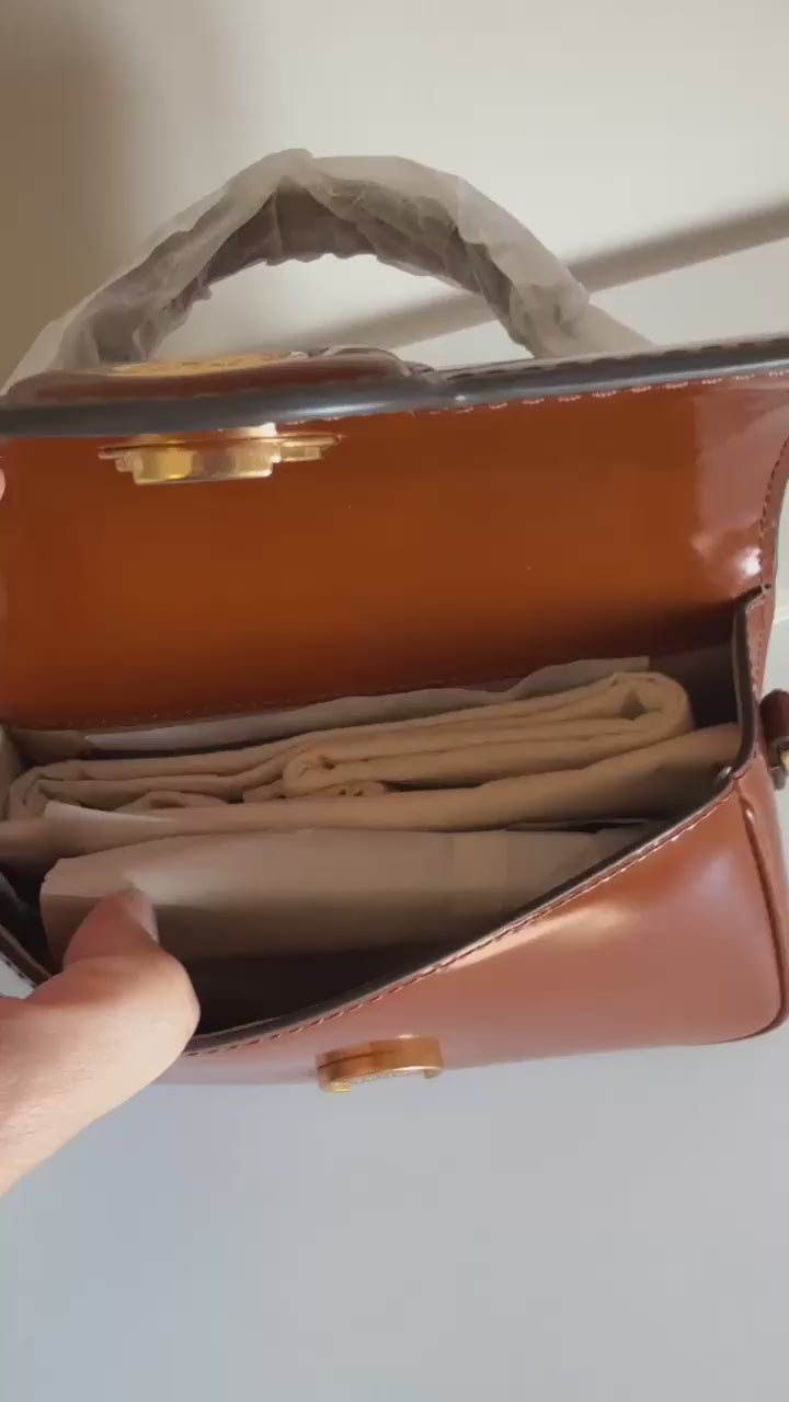 Tory Burch Robinson small brown top handle bag product video