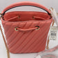 Michael Kors Suri Small Bucket Crossbody Bag Vegan Faux Quilted Leather - Grapefruit